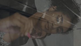 Animation of financial data processing over diverse colleagues writing on glass board at office. Global finance and business technology concept - Powered by Shutterstock - Get 15% off with code: PIKWIZARD15