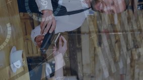 Animation of financial data processing over caucasian woman paying with card in cafe. Global business, finances, computing and data processing concept digitally generated video. - Powered by Shutterstock - Get 15% off with code: PIKWIZARD15