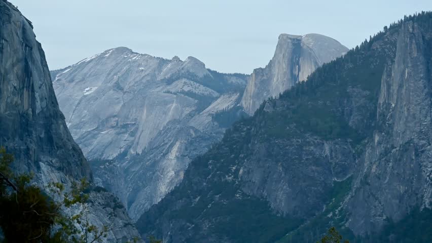 Mariposa County, California, USA - May 25, 2025: Vista of Half Dome peak and Yosemite Valley from the Tunnel View observation point at Yosemite National Park in Northern California.