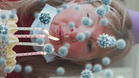 Animation of covid 19 virus cells over caucasian senior woman wearing face mask celebrating birthday. global covid 19 pandemic concept digitally generated video. - Powered by Shutterstock - Get 15% off with code: PIKWIZARD15