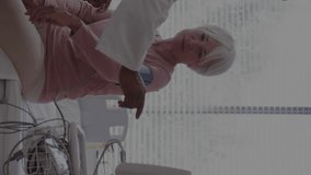 Animation of heart beat monitor over african american male doctor with patient. Global medicine, healthcare, digital interface, computing and data processing concept digitally generated video. - Powered by Shutterstock - Get 15% off with code: PIKWIZARD15