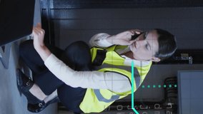 Animation of data processing over caucasian engineer woman using laptop. Global engineering, digital interface, computing and data processing concept digitally generated video. - Powered by Shutterstock - Get 15% off with code: PIKWIZARD15