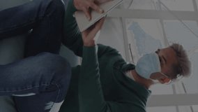 Animation of digital interface showing statistics with man using tablet wearing face masks. Healthcare and protection during coronavirus covid 19 pandemic, digitally generated video - Powered by Shutterstock - Get 15% off with code: PIKWIZARD15