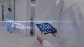 Doctor tapping tablet and following nurse along hall while updating medical charts and code streams. Medical, technology, futuristic, healthcare, digital, data, analysis - Powered by Shutterstock - Get 15% off with code: PIKWIZARD15