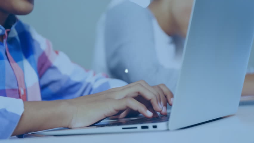 Teenage boy typing laptop in lab generating expanding shopping cart chart network overlaying peers. Technology, data, analytics, education, digital, connectivity, innovation - Powered by Shutterstock - Get 15% off with code: PIKWIZARD15