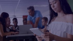 Teenage girl tapping tablet shifting holo map in class, teacher pointing at laptop guiding students. Interactive, education, technology, innovation, collaboration, digital, classroom - Powered by Shutterstock - Get 15% off with code: PIKWIZARD15