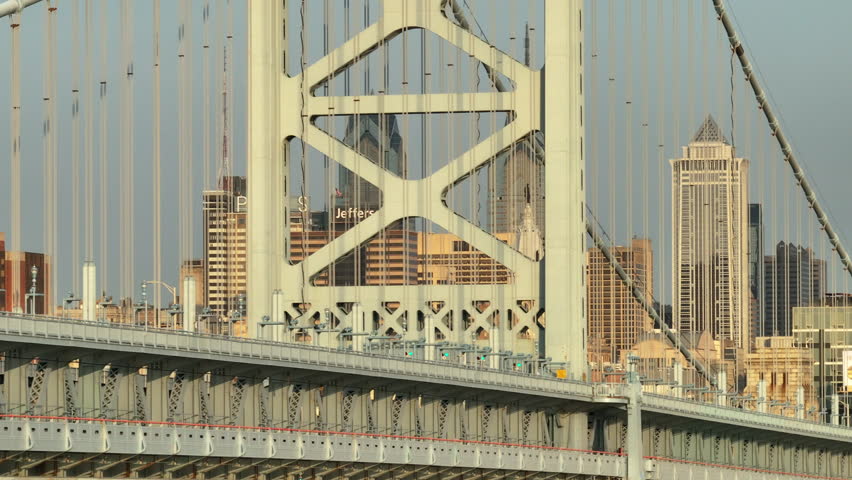 Philadelphia, Pennsylvania, United States - July 24 2025: Aerial view of Philadelphia and the Ben Franklin Bridge. Shot at sunrise on a summer morning.