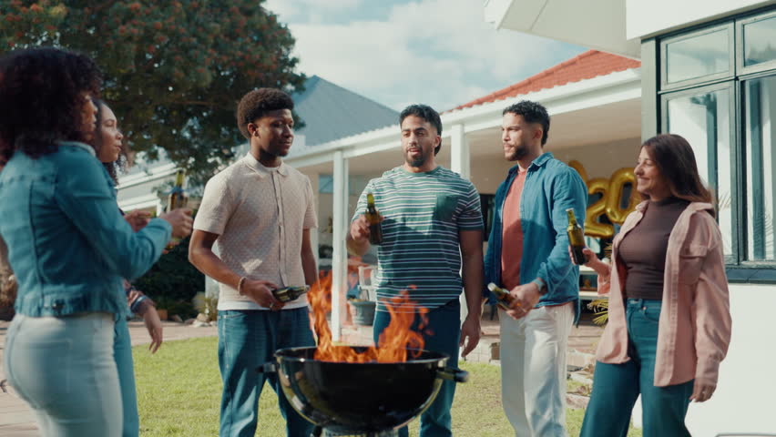 Cheers, beer and friends at outdoor barbecue for new years party, celebration or event in backyard. Happy, bonding and group of people with alcohol beverage for toast together by fire for grill.