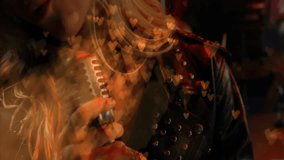 Camera pulling back showing singer at mic singing with strumming guitarist for music amid hearts. Musician, performance, dramatic, romantic, live, emotional, stage - Powered by Shutterstock - Get 15% off with code: PIKWIZARD15