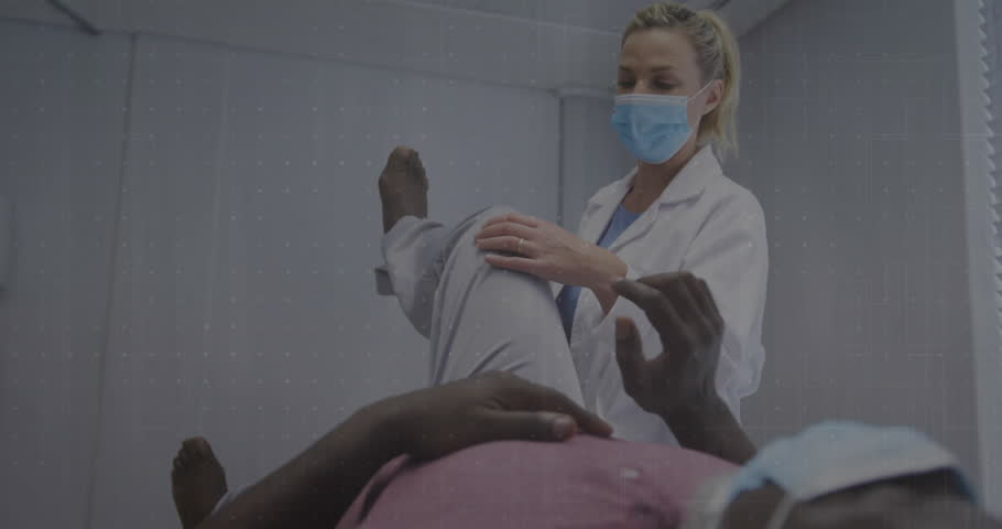 Health charts appearing and guiding therapist flexing patient knee while graphs updating metrics. Medical, technology, rehabilitation, data, healthcare, analysis, diagnostics