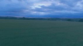 Aerial panning over farmland starting icons animating to show environmental metrics. Environment, sustainability, conservation, renewable, digital, ecological, analytics - Powered by Shutterstock - Get 15% off with code: PIKWIZARD15