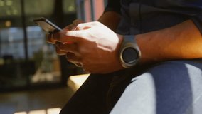 User tapping smartphone screen activating social icons shifting in notification flow for demo. Digital, connectivity, interface, innovation, technology, urban, modern - Powered by Shutterstock - Get 15% off with code: PIKWIZARD15