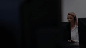 Brunette call center agent initiating call and processing call data with scrolling logs overlay. Workflow, communication, technology, corporate, professionalism, data management, collaboration - Powered by Shutterstock - Get 15% off with code: PIKWIZARD15