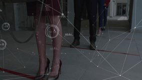 Camera pulling back showing four masked users on red markers, scrolling phones under tech overlay. Queue, social distancing, digital connection, technology, modern architecture, communication, network - Powered by Shutterstock - Get 15% off with code: PIKWIZARD15