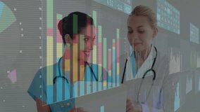 Two doctors using tablet controlling floating charts and analyzing patient data for diagnosis. Medical, collaboration, futuristic, technology, healthcare, innovation, teamwork - Powered by Shutterstock - Get 15% off with code: PIKWIZARD15