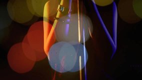 Teenage singer touching and cradling mic while facing camera illustrating music with bokeh lights. Portrait, performer, stage, ambient, artistic, emotion, expression - Powered by Shutterstock - Get 15% off with code: PIKWIZARD15