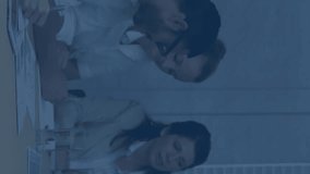 Animation of flowchart of icons over diverse coworkers discussing strategy in office. Digital composite, multiple exposure, communication, planning, teamwork, direction and technology concept. - Powered by Shutterstock - Get 15% off with code: PIKWIZARD15