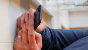 Animation of clock moving and shapes over caucasian businessman using smartphone. global business and digital interface concept digitally generated video. - Powered by Shutterstock - Get 15% off with code: PIKWIZARD15