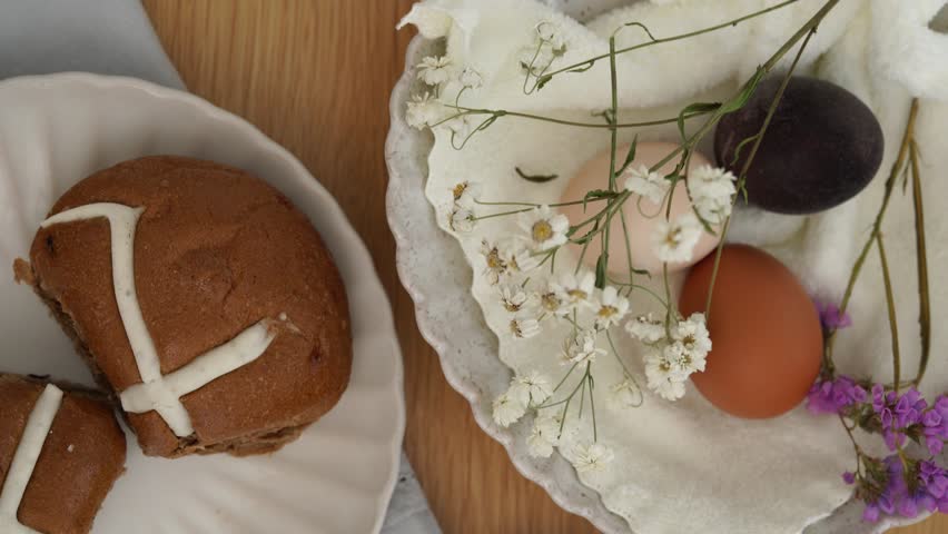Easter Celebration Table Setting Featuring Beautiful Decorative Eggs Alongside Various Treats