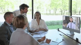 Business people meeting conference discussion corporate concept with collegue in video chart, discussing financial report of their company. - Powered by Shutterstock - Get 15% off with code: PIKWIZARD15