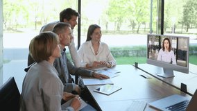 Business people meeting conference discussion corporate concept with collegue in video chart, discussing financial report of their company. - Powered by Shutterstock - Get 15% off with code: PIKWIZARD15