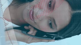 Animation of globe over businesswoman using phone headset. Global business and digital interface concept digitally generated video. - Powered by Shutterstock - Get 15% off with code: PIKWIZARD15