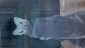 Animation of interface with data processing over low section of man running on treadmill at the gym. Sports fitness and business interface technology concept - Powered by Shutterstock - Get 15% off with code: PIKWIZARD15