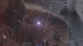 Animation of light trails and network of connections over african american woman. Sport, connections and digital interface concept digitally generated video. - Powered by Shutterstock - Get 15% off with code: PIKWIZARD15