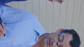 Animation of message icon against diverse colleagues discussing together at office. Global networking and business technology concept - Powered by Shutterstock - Get 15% off with code: PIKWIZARD15