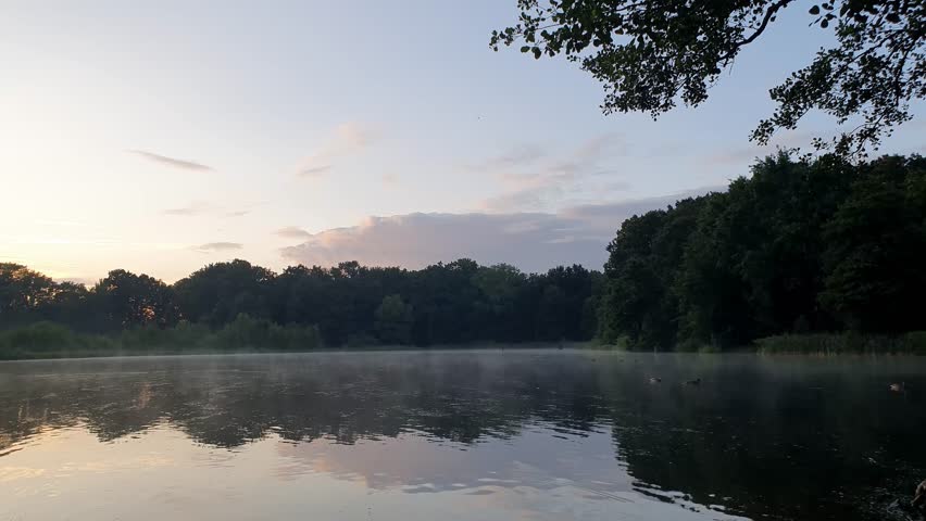 thundercloud over lake, before storm, hail cloud moves quickly across sky, natural phenomenon, beautiful sky, foggy evening, fog over the lake