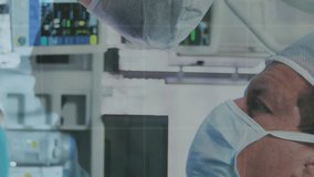 Stock market data processing over male and female surgeons performing operation at hospital. Medical healthcare and technology concept - Powered by Shutterstock - Get 15% off with code: PIKWIZARD15