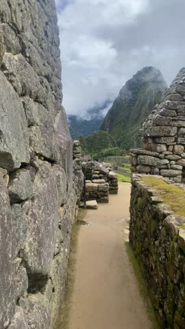 Machu Picchu Inca ruin in clouds, Machu Picchu historical sanctuary, Cusco, Peru.