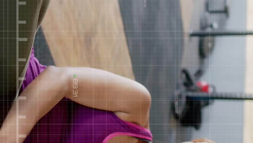 Graph animation over women exercising with fitness ball in gym. workout, exercise, training, wellness, health, cardio - Powered by Shutterstock - Get 15% off with code: PIKWIZARD15