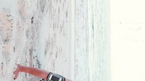 Exercising on beach, person doing push-ups with fitness tracker animation over ocean. workout, exercise, health, technology, outdoors, wellness - Powered by Shutterstock - Get 15% off with code: PIKWIZARD15