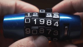 Security Code from the Past to the Future: Hand Rotating Dials on a Combination Padlock from number of 20th century to 2030. - Powered by Shutterstock - Get 15% off with code: PIKWIZARD15