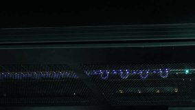 Cloud icon with charts and graphs processing data over glowing servers in dark computer server room. Communication, data and digital interface technology, digitally generated video. - Powered by Shutterstock - Get 15% off with code: PIKWIZARD15