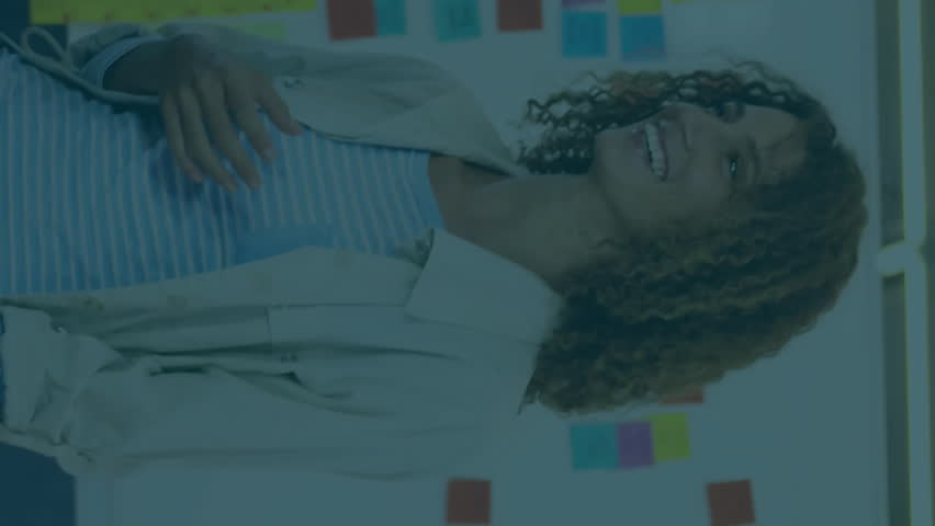 Animation of financial data processing over diverse business people in office. Global finance, business, connections, computing and data processing concept digitally generated video. - Powered by Shutterstock - Get 15% off with code: PIKWIZARD15