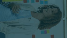 Animation of financial data processing over diverse business people in office. Global finance, business, connections, computing and data processing concept digitally generated video. - Powered by Shutterstock - Get 15% off with code: PIKWIZARD15