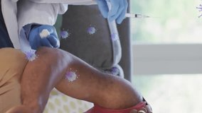 Animation of virus cells over male doctor with patient taking vaccine. Global medicine and digital interface concept digitally generated video. - Powered by Shutterstock - Get 15% off with code: PIKWIZARD15