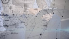 Male professional tapping tablet to activate tech data overlay and analyzing charts in office. Technology, data visualization, business intelligence, analytics, modern workspace, digital interface, - Powered by Shutterstock - Get 15% off with code: PIKWIZARD15