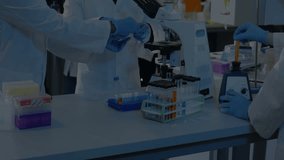 Lab research team drawing samples with pipettes and using microscope causing data overlay expanding. Science, collaboration, innovation, technology, precision, analytical, teamwork - Powered by Shutterstock - Get 15% off with code: PIKWIZARD15