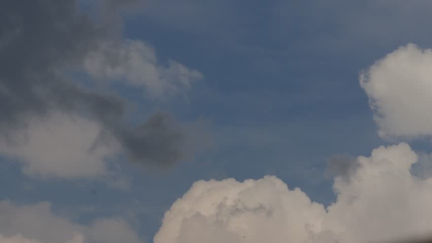 Clouds Moving on the Sky on a Rainy Summer Day. Stormy Clouds in the Air in a Day with Bad Weather.