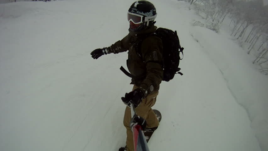 Snowboarding Backcountry In Deep Powder Snow, pov 