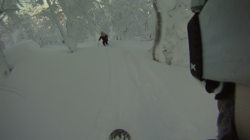 Snowboarding Backcountry In Deep Powder Snow pov 