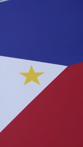 Philippines flag in red, white and blue colors as a symbol of independence. Flag of Philippines as a background for your design