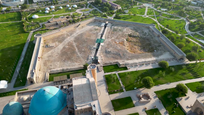 Aerial view of the Hazret Sultan historical and cultural museum-reserve in Turkistan, Kazakhstan. The complex features traditional architecture and surrounding city landscapes.