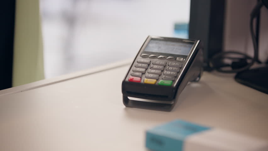 Cashless payment credit card paying cropped view customer buy medicine in pharmacy order pills drugs vitamins purchase pharmacist drugstore online banking medication shopping pay terminal health care