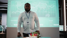 Diverse project team meeting after hours to share data visualization reports, discuss business intel and prepare forecasts for upcoming presentations to enterprise shareholders after hours. Camera A. - Powered by Shutterstock - Get 15% off with code: PIKWIZARD15