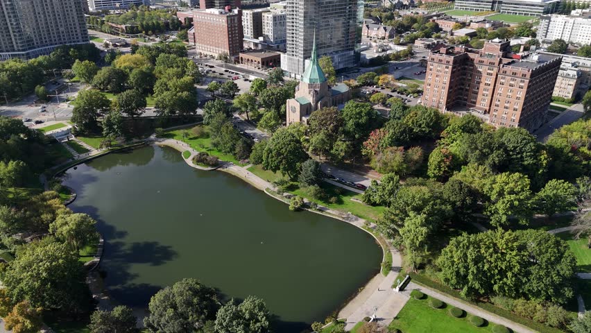 Cleveland, Ohio USA. Aerial View of United Methodist Church and Lagoon, City Suburbs on Sunny Day