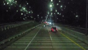 a bus journey at night when it is raining - Powered by Shutterstock - Get 15% off with code: PIKWIZARD15